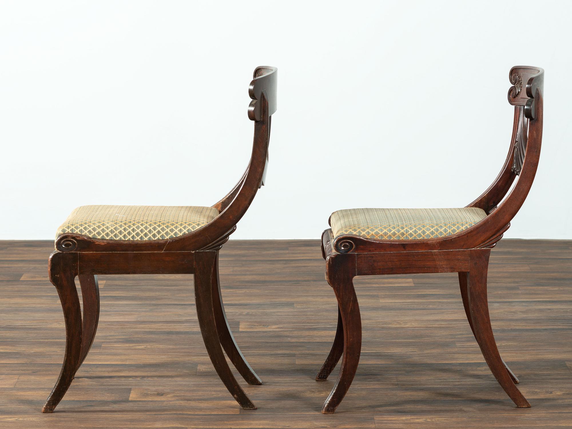 A Pair of Classical Drapery Carved Mahogany Side Chairs