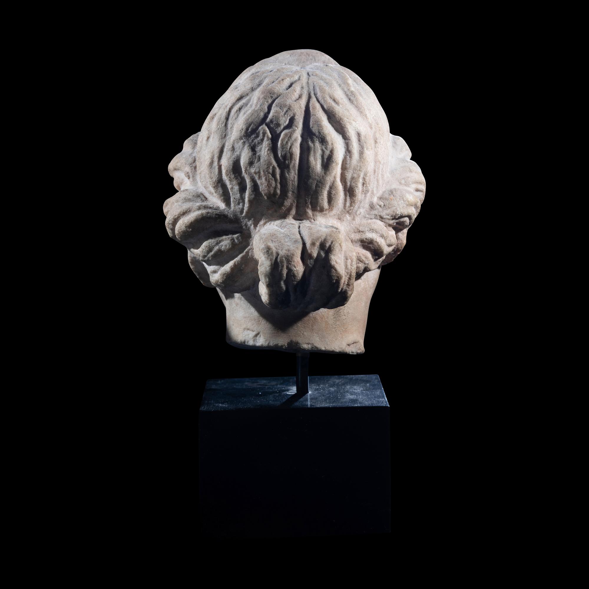 A Roman Marble Head of a Goddess