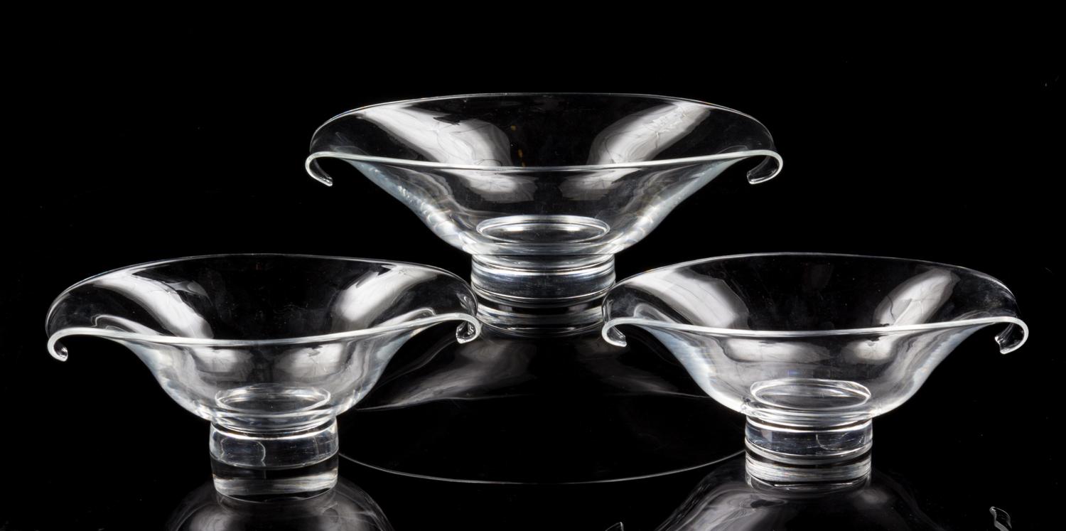 A Set of Three Steuben Glass Bowls Width of largest 11 1/2 inches.