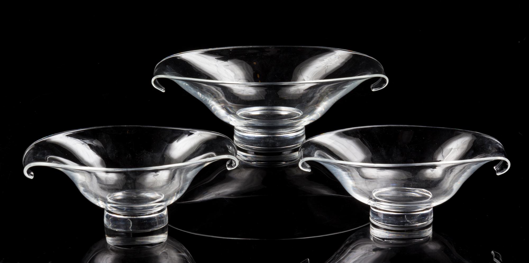 A Set of Three Steuben Glass Bowls Width of largest 11 1/2 inches.