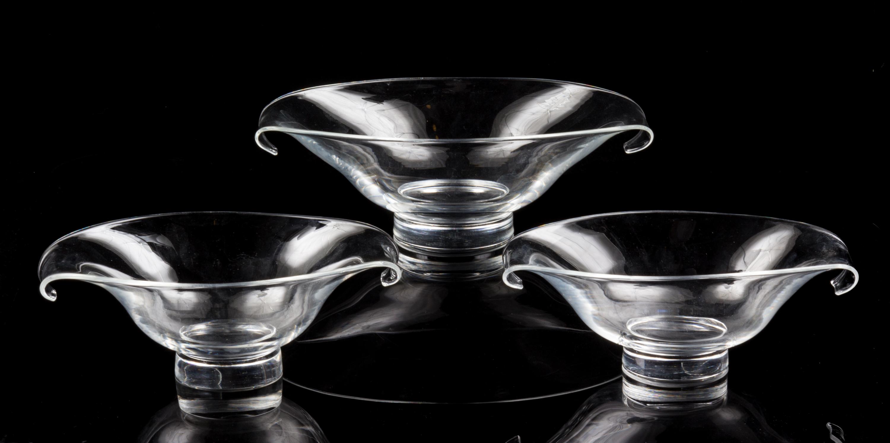 A Set of Three Steuben Glass Bowls Width of largest 11 1/2 inches.