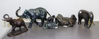 A Group of Five Metal Elephant Figures Height of tallest 9 1/2 inches.