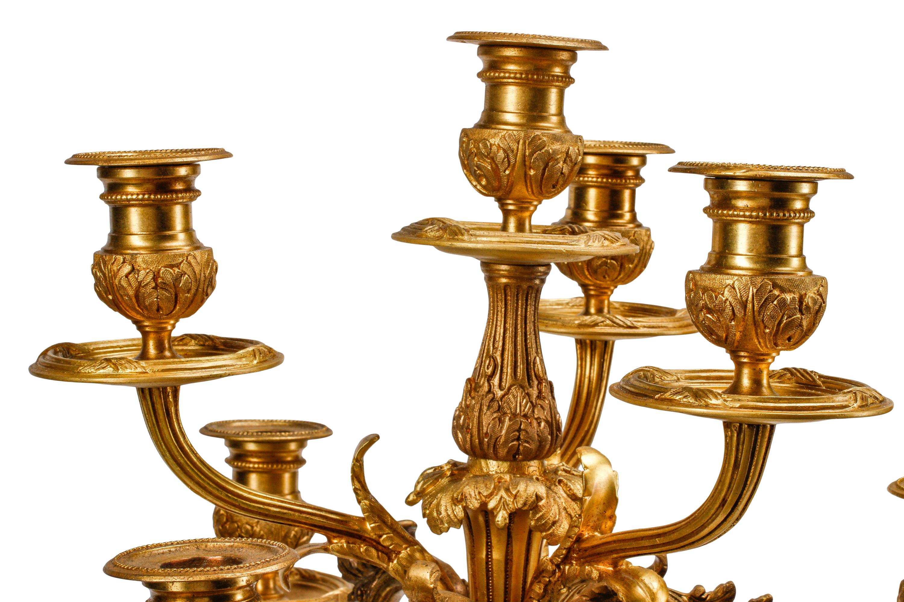 A Pair of Louis XV Style Gilt Bronze and Marble Seven-Light Candelabra