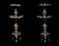 A Large Pair of Bronze Candle Holders
