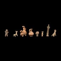 Eight Near Eastern Terracotta Figurines and Vessels