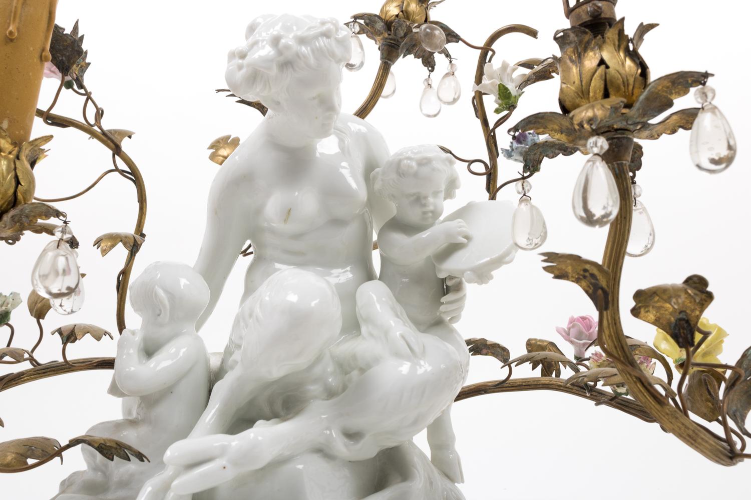 A Gilt Metal Mounted White Glazed Porcelain Figural Group after Clodion Mounted as a Lamp