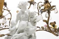 A Gilt Metal Mounted White Glazed Porcelain Figural Group after Clodion Mounted as a Lamp
