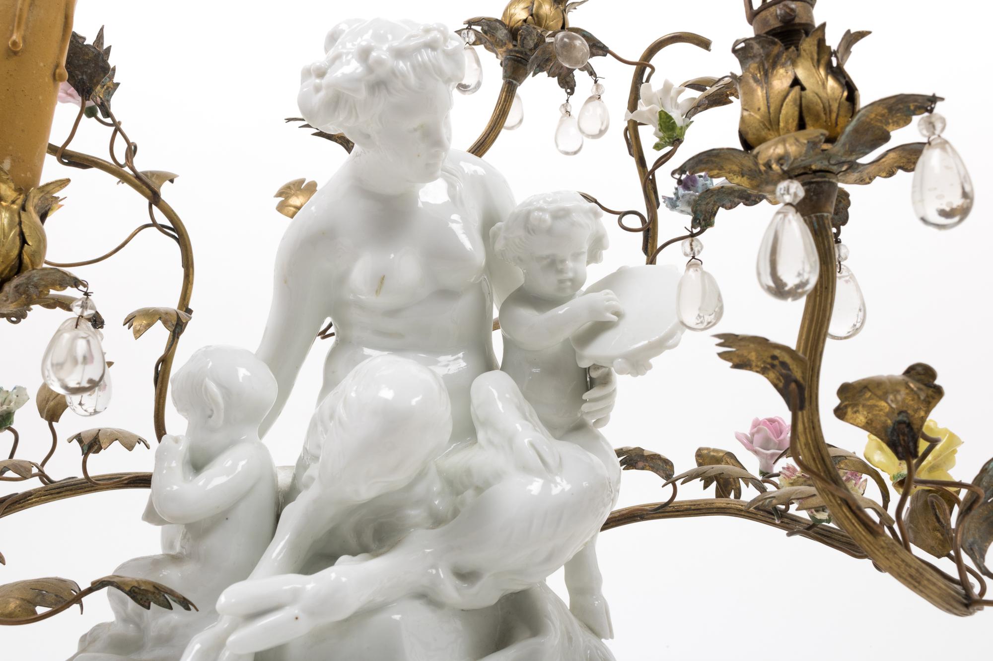A Gilt Metal Mounted White Glazed Porcelain Figural Group after Clodion Mounted as a Lamp