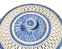 A Chinese Export Porcelain Reticulated Chestnut Covered Bowl and Undertray