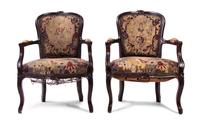 A Pair of Louis XV Style Oak Fauteuils, Height 34 inches.