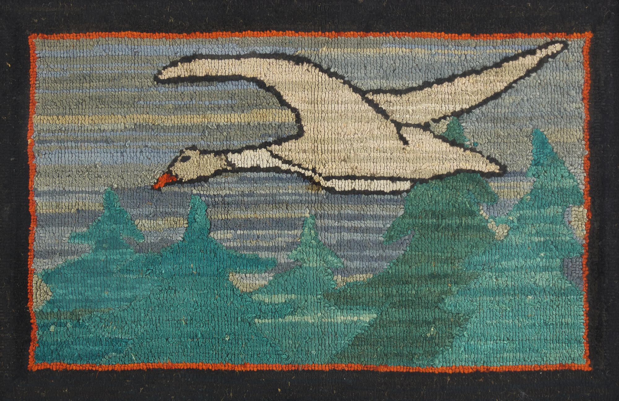 A Grenfell Table Mat Depicting a Snow Goose