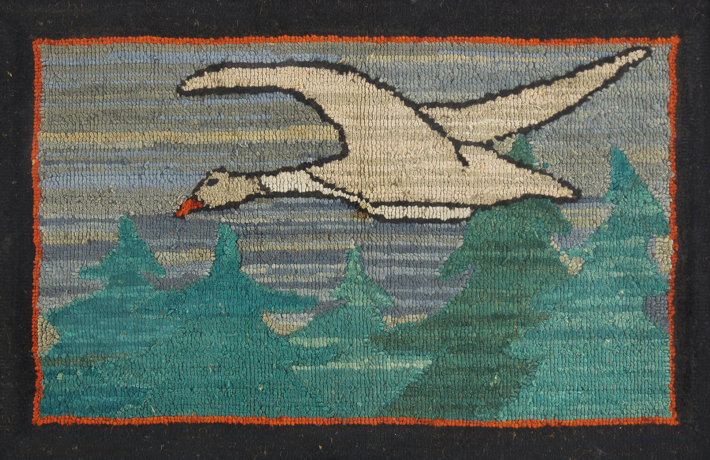 A Grenfell Table Mat Depicting a Snow Goose