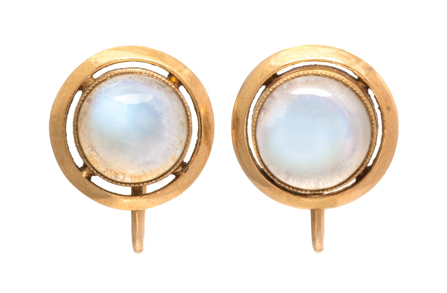 A Pair of Yellow Gold and Moonstone Screw Back Earclips, 2.80 dwts.