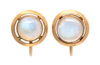 A Pair of Yellow Gold and Moonstone Screw Back Earclips, 2.80 dwts.