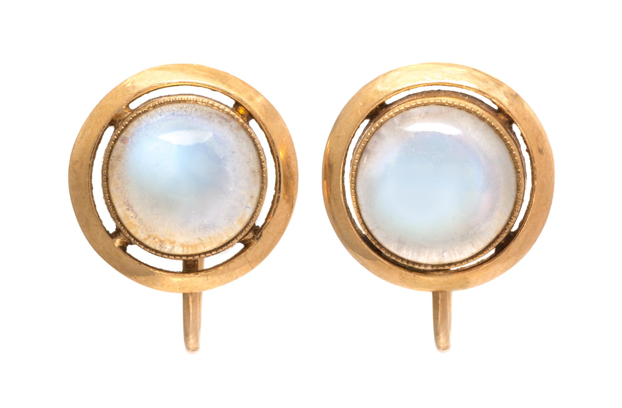 A Pair of Yellow Gold and Moonstone Screw Back Earclips, 2.80 dwts.