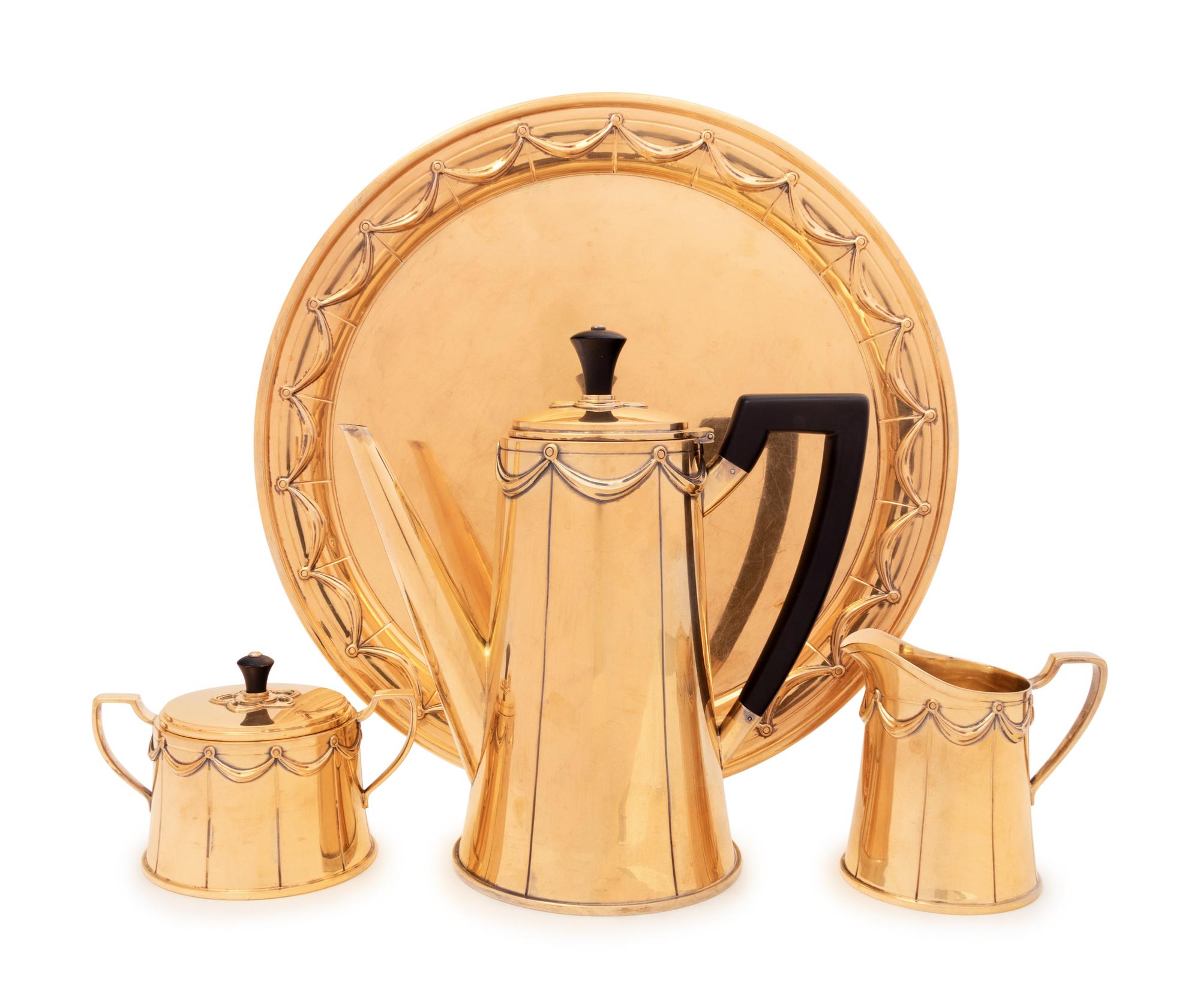 A Tiffany & Co. Silver-Gilt Four-Piece Coffee Service