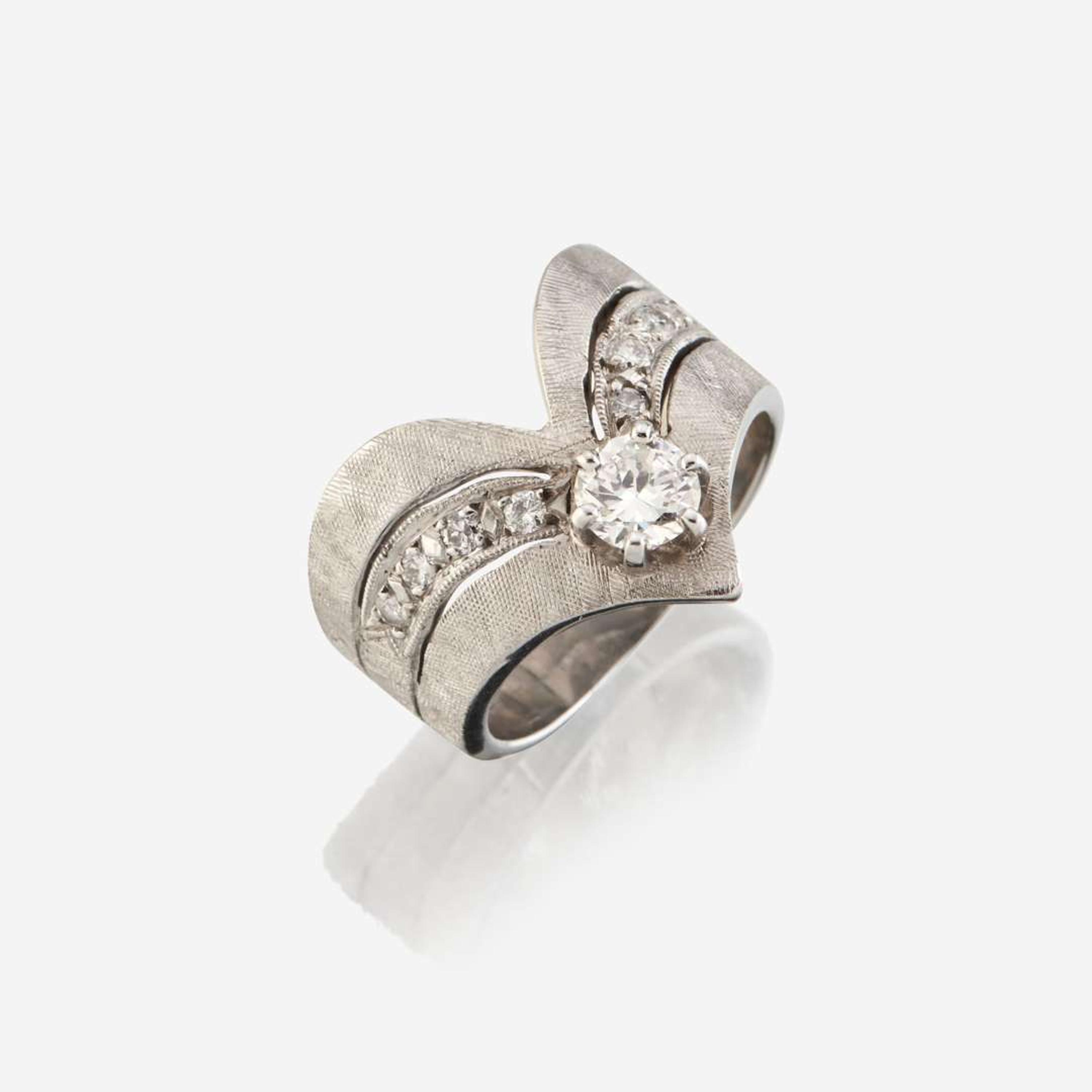 A diamond and white gold ring