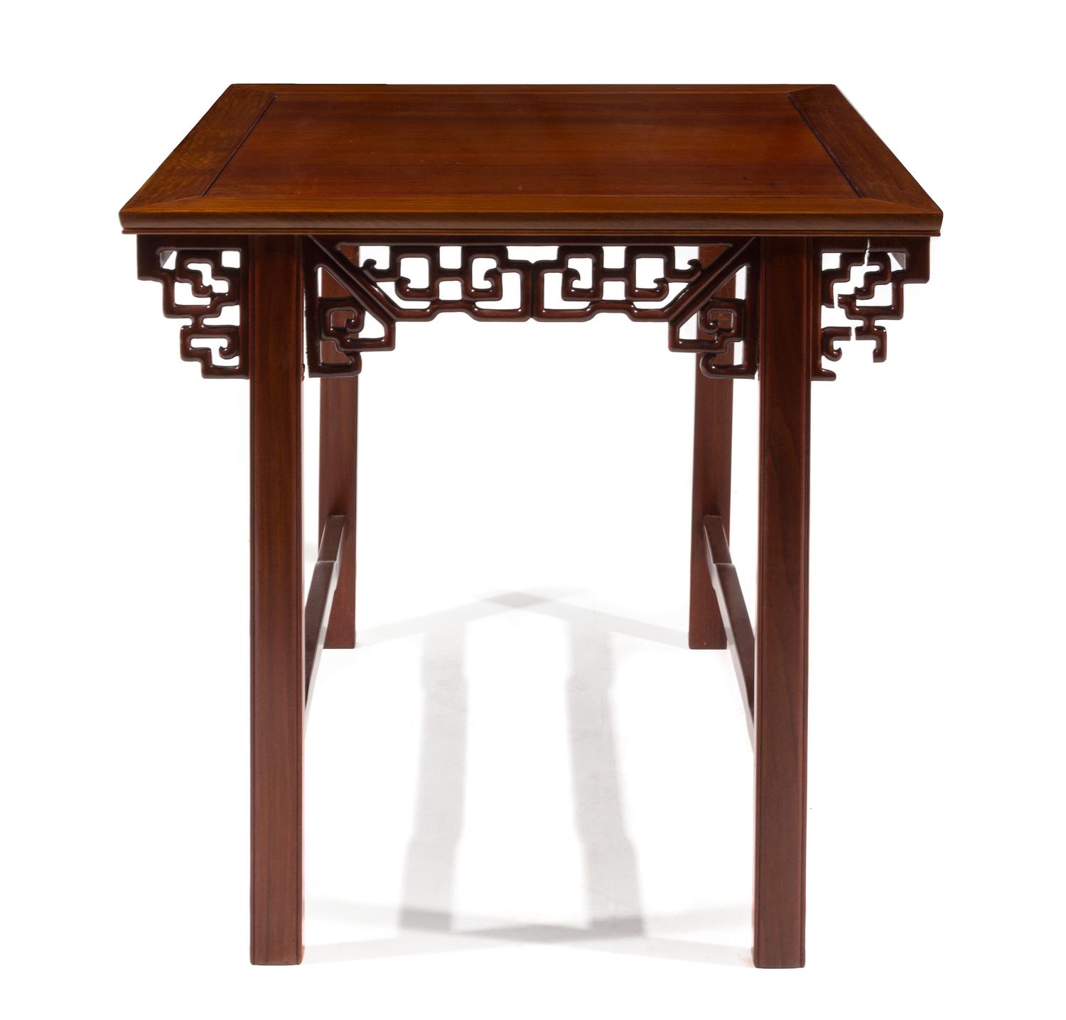 A Carved Hardwood Table — 20TH CENTURY