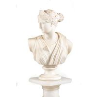 A Continental White Marble Bust of Diana the Huntress