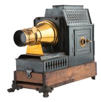 [EARLY PHOTOGRAPHY - MAGIC LANTERN]. A French magic lantern by H. Coulon, with accessories.