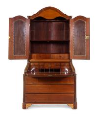 A Baltic Neoclassical Parcel Gilt Walnut Secretary
