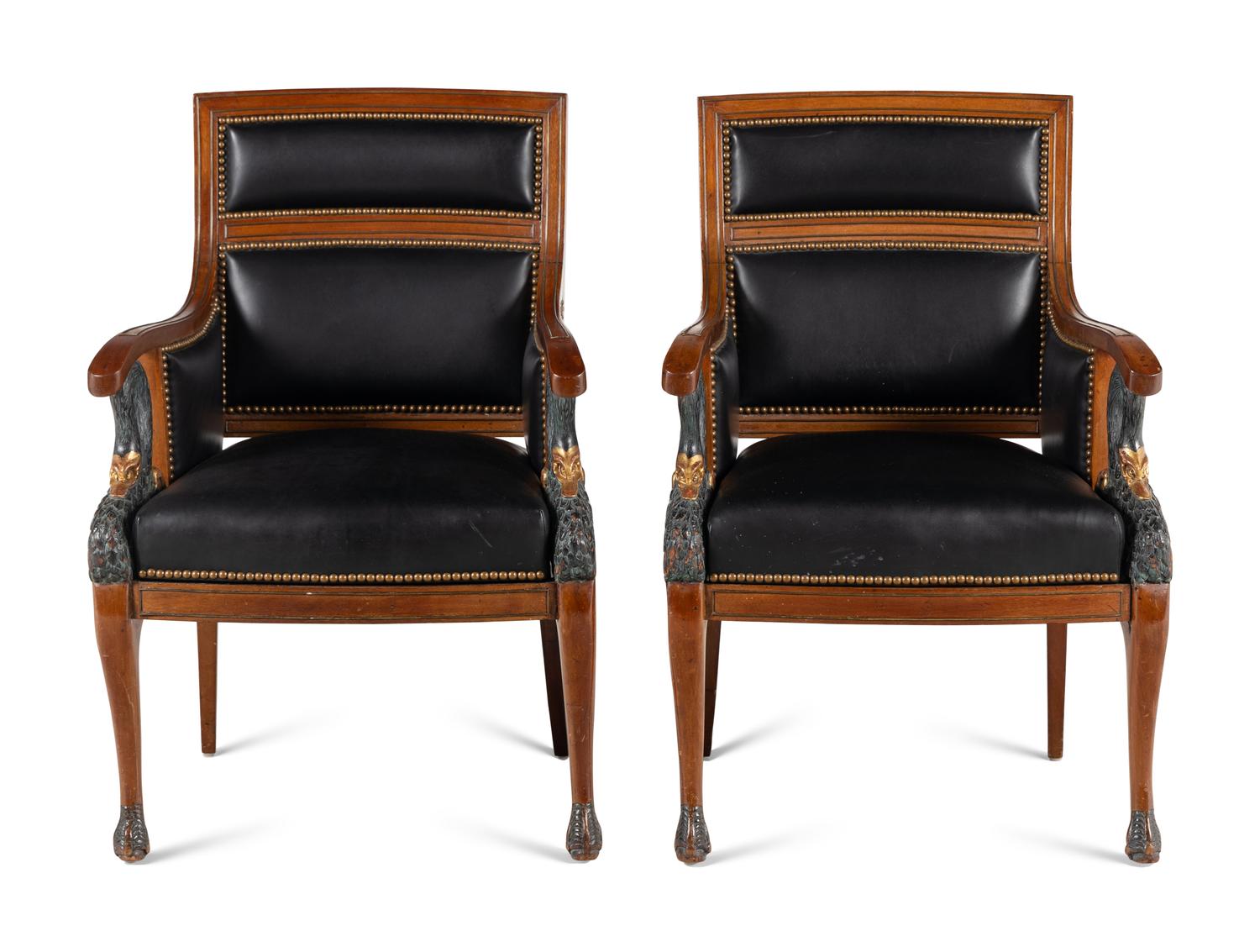 A Pair of Empire Style Painted and Parcel Gilt Mahogany Armchairs