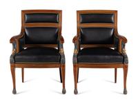 A Pair of Empire Style Painted and Parcel Gilt Mahogany Armchairs