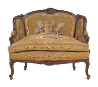 A Louis XV Style Carved Walnut Settee with Tapestry Upholstery