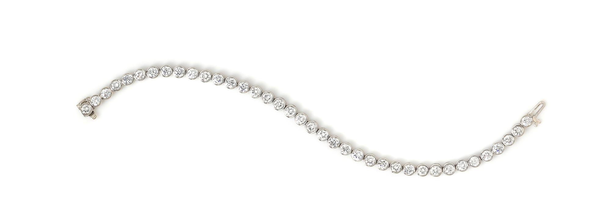 A White Gold and Diamond Line Bracelet, 9.80 dwts.