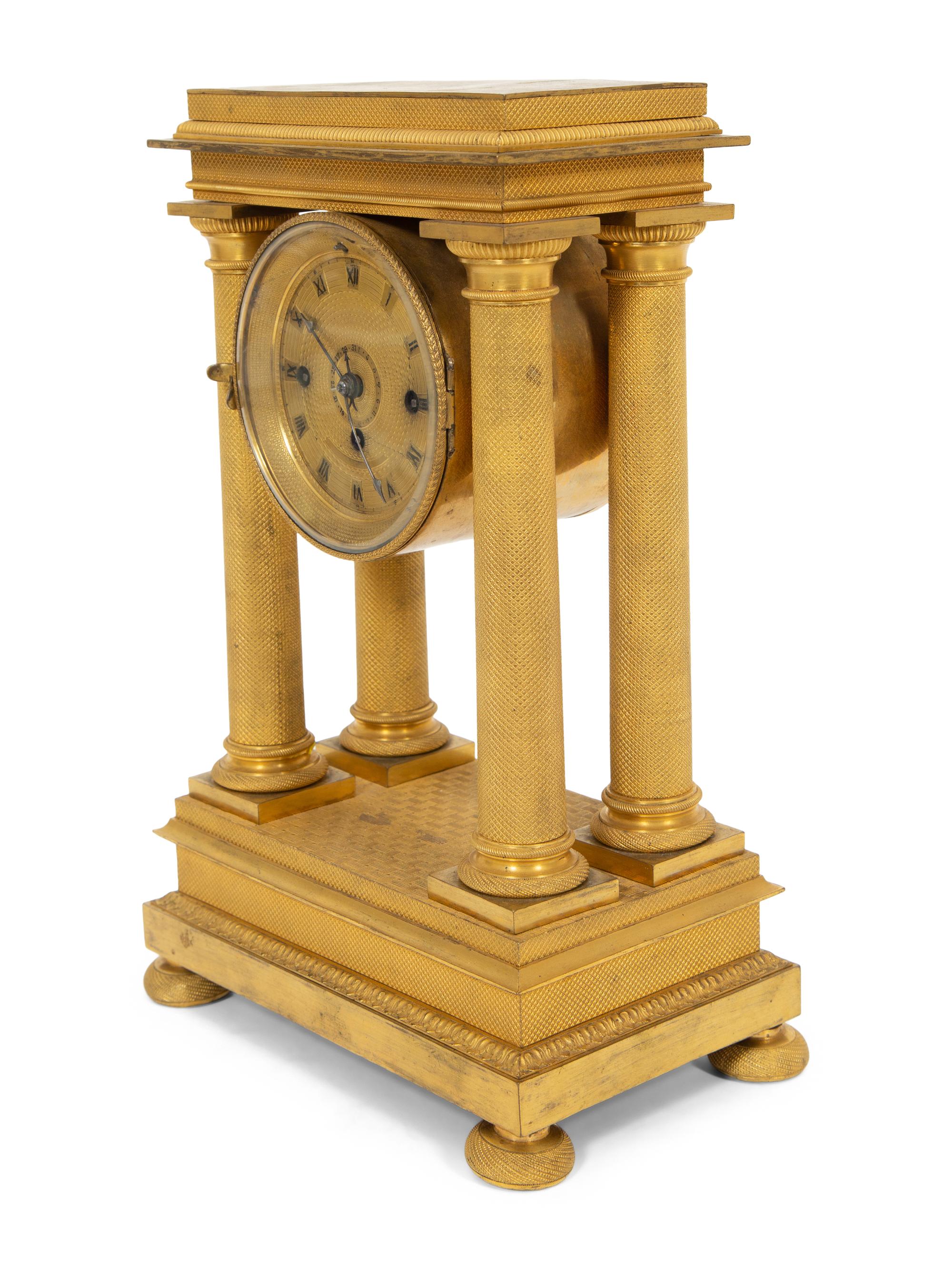 An Empire Style Gilt Bronze Portico Clock