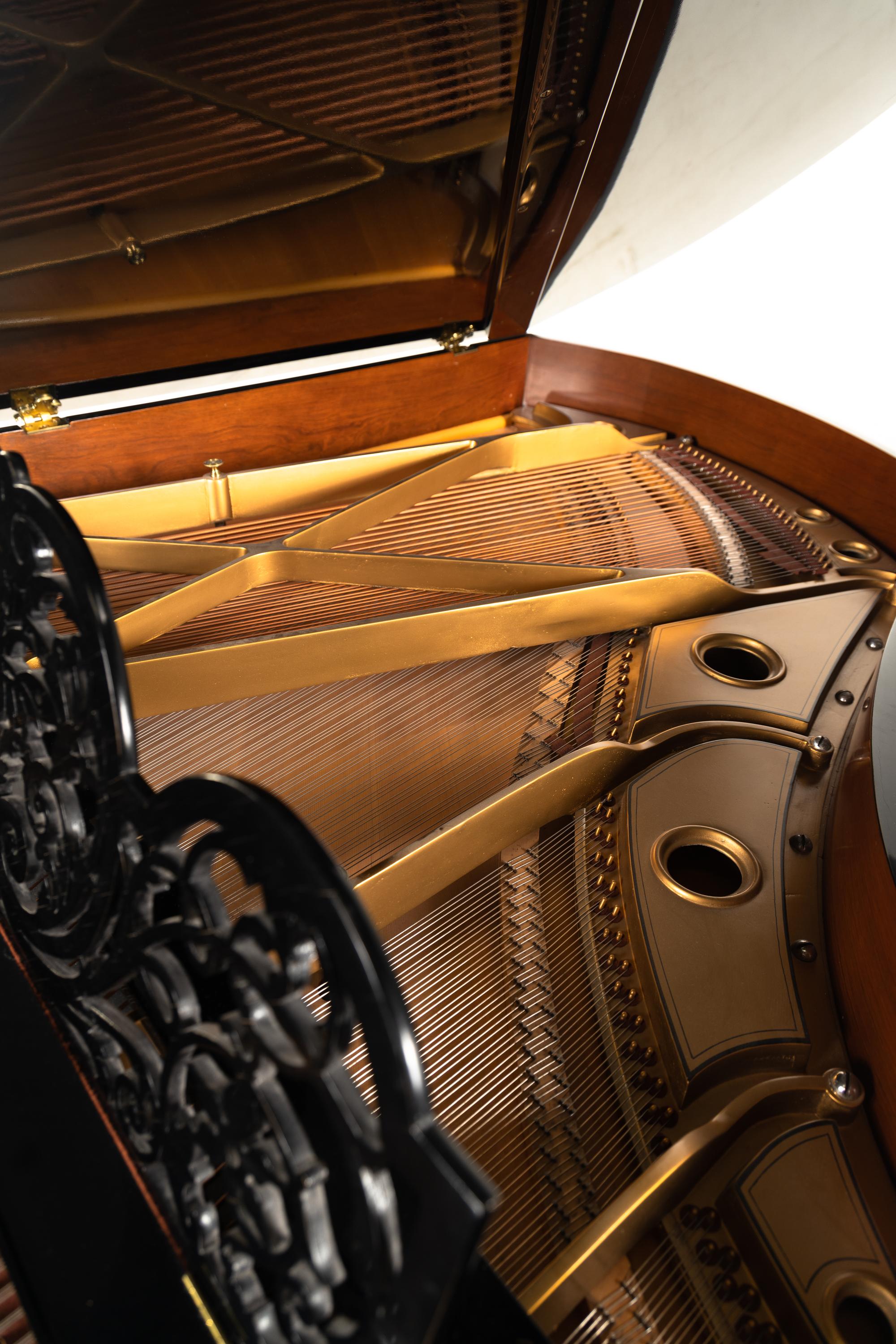 A Neufeld Black Lacquer Grand Piano