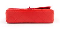 A Chanel Red Lambskin Quilted Flap Bag, 10" x 7" x 2.75"; Strap drop: 19".