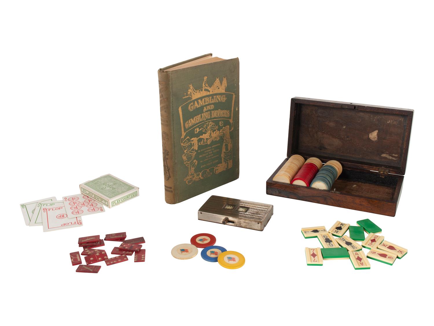 [GAMING]. A large grouping of gambling and game pieces, comprising: