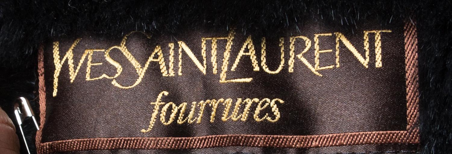 An Yves Saint Laurent Maroon Leather Swing Coat,
