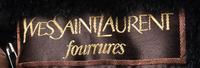 An Yves Saint Laurent Maroon Leather Swing Coat,
