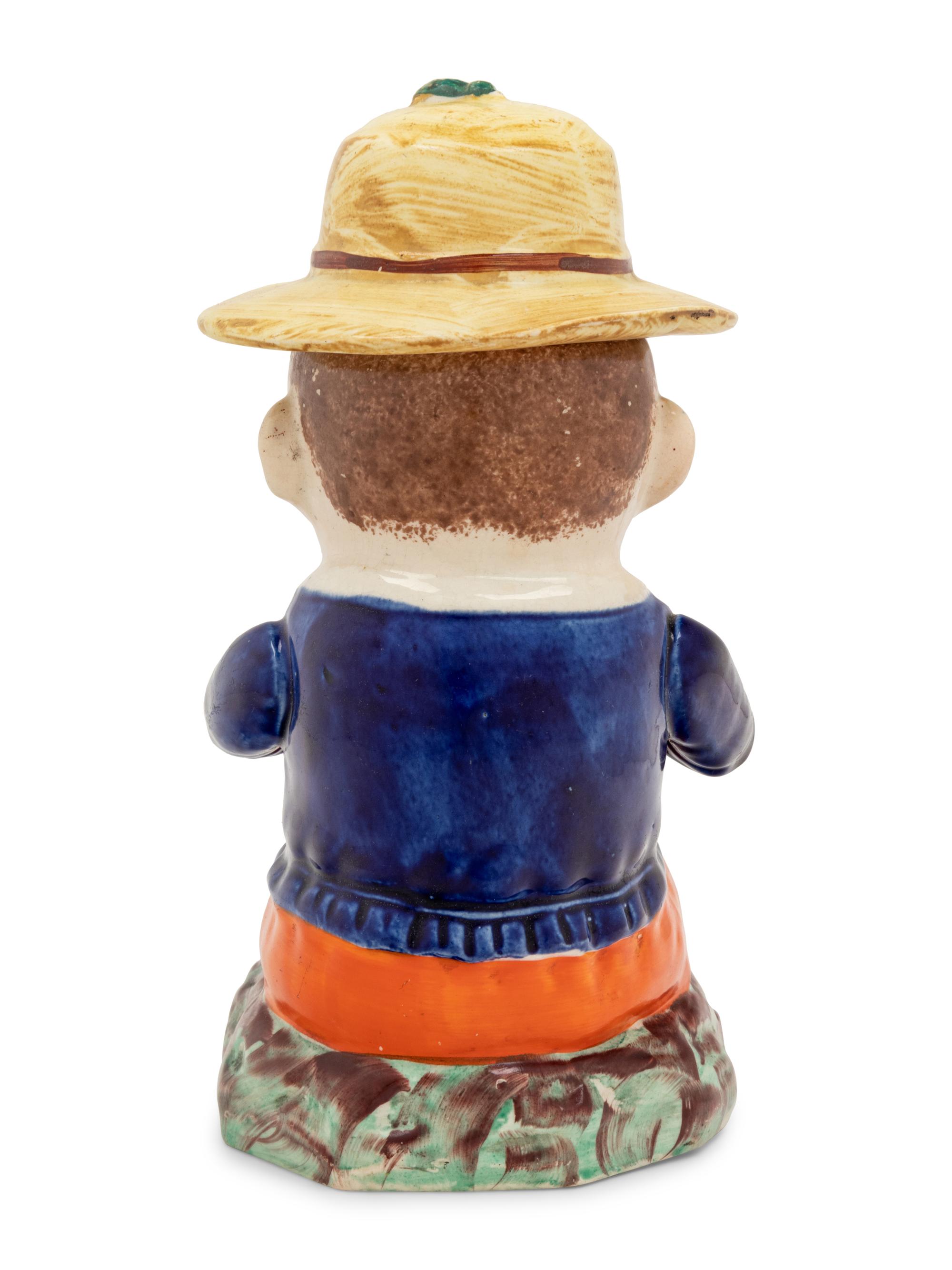 A Staffordshire Figural Tobacco Jar