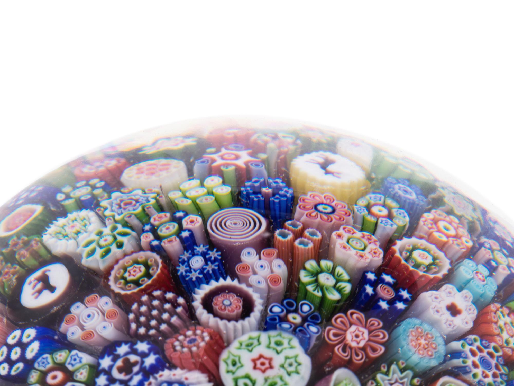 A Four-Color Ribbon and Latticino Twist Crown Glass Paperweight