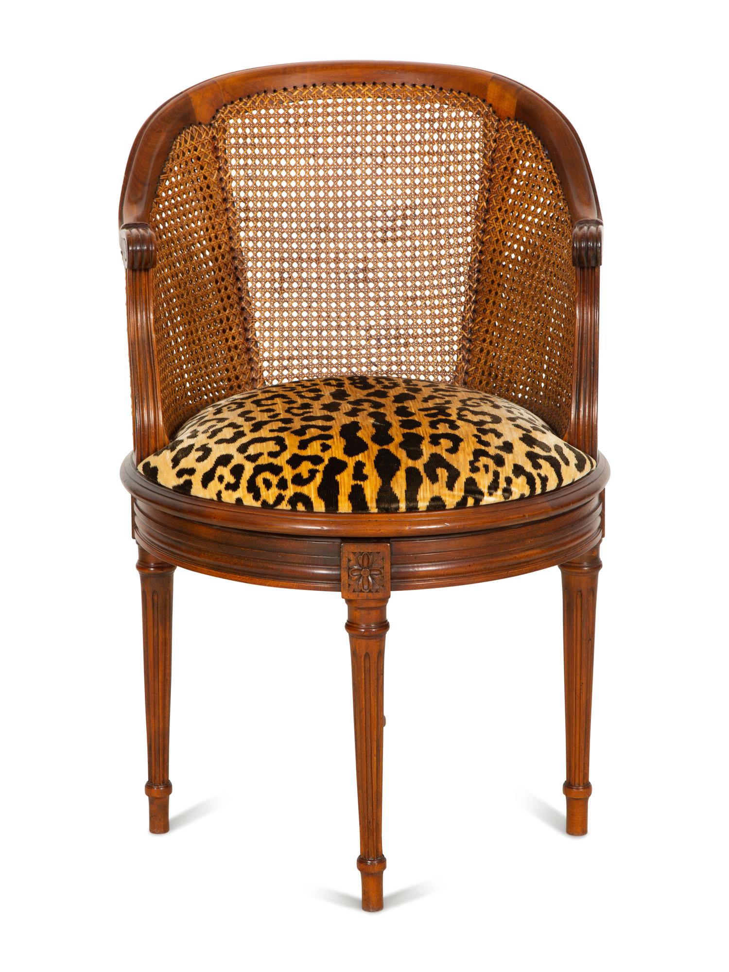 A Louis XVI Style Caned Bureau Chair