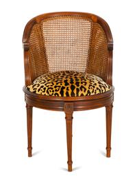 A Louis XVI Style Caned Bureau Chair