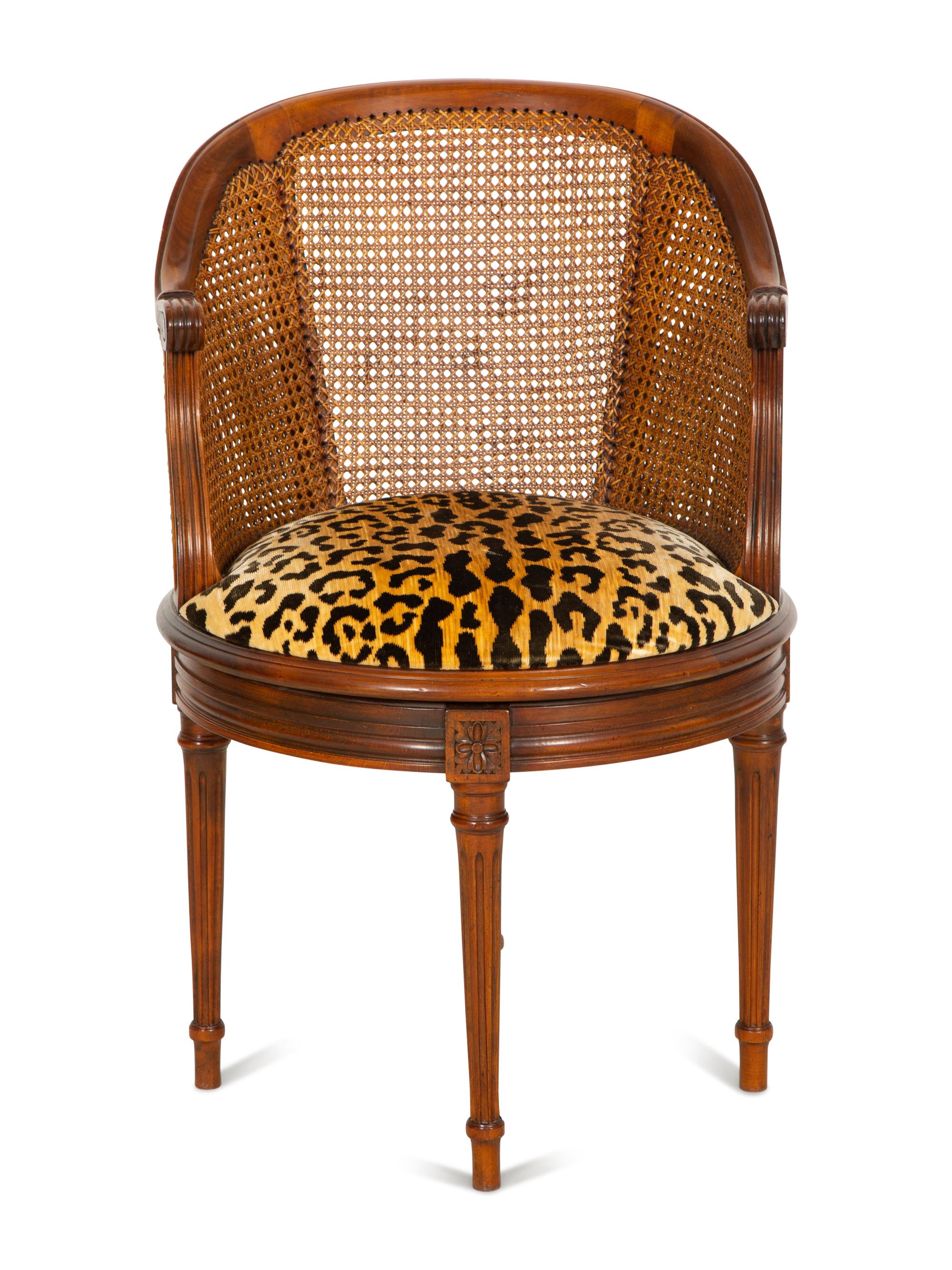 A Louis XVI Style Caned Bureau Chair