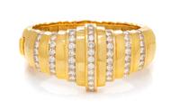 A Yellow Gold and Diamond Bangle Bracelet, 52.00 dwts.