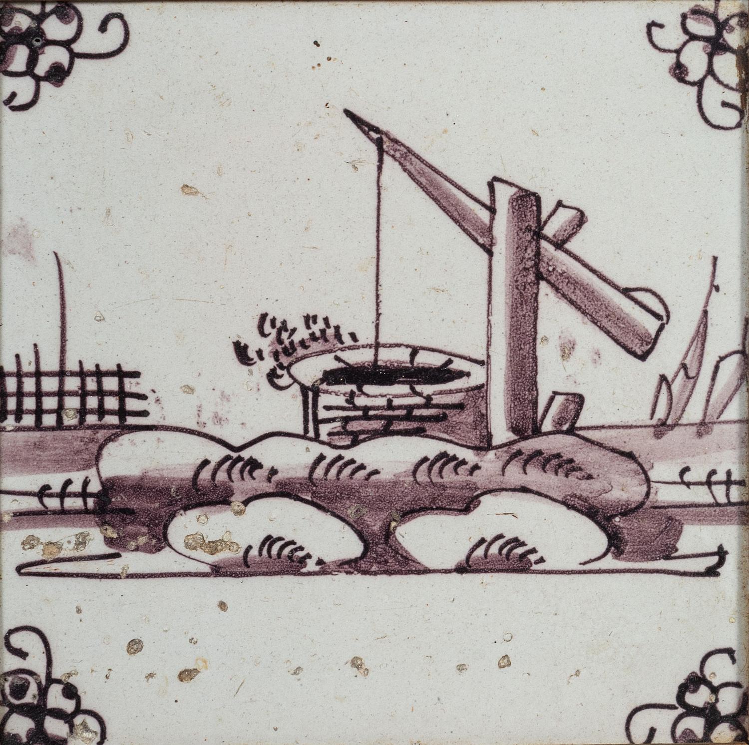 A Set of Five Framed Puce Delft Tiles