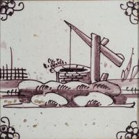 A Set of Five Framed Puce Delft Tiles