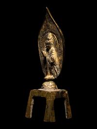 A Gilt Bronze Votive Figure of Standing Buddha