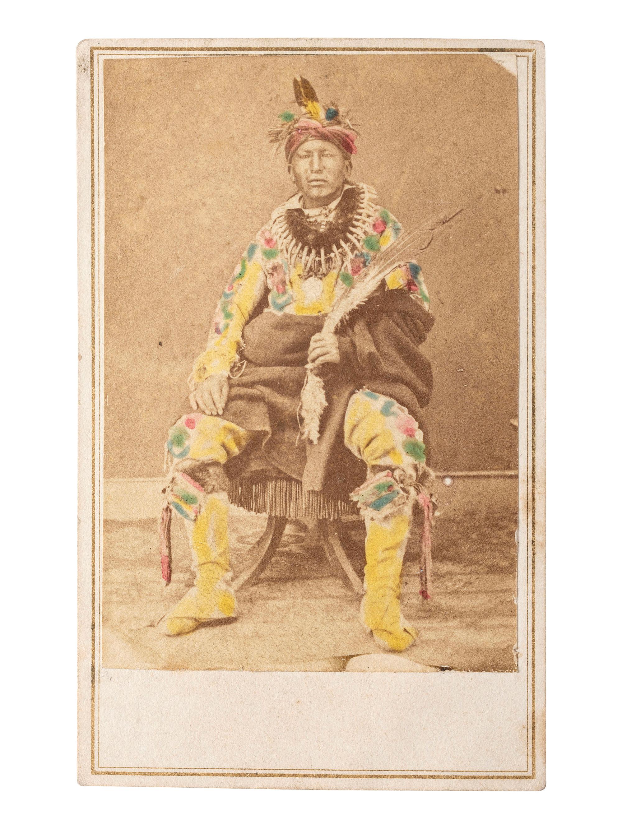 [NATIVE AMERICANS]. BARKER, A.W., photographer. Hand-colored CDV of Sac and Fox Chief, Red Stone. Ottawa, KS.