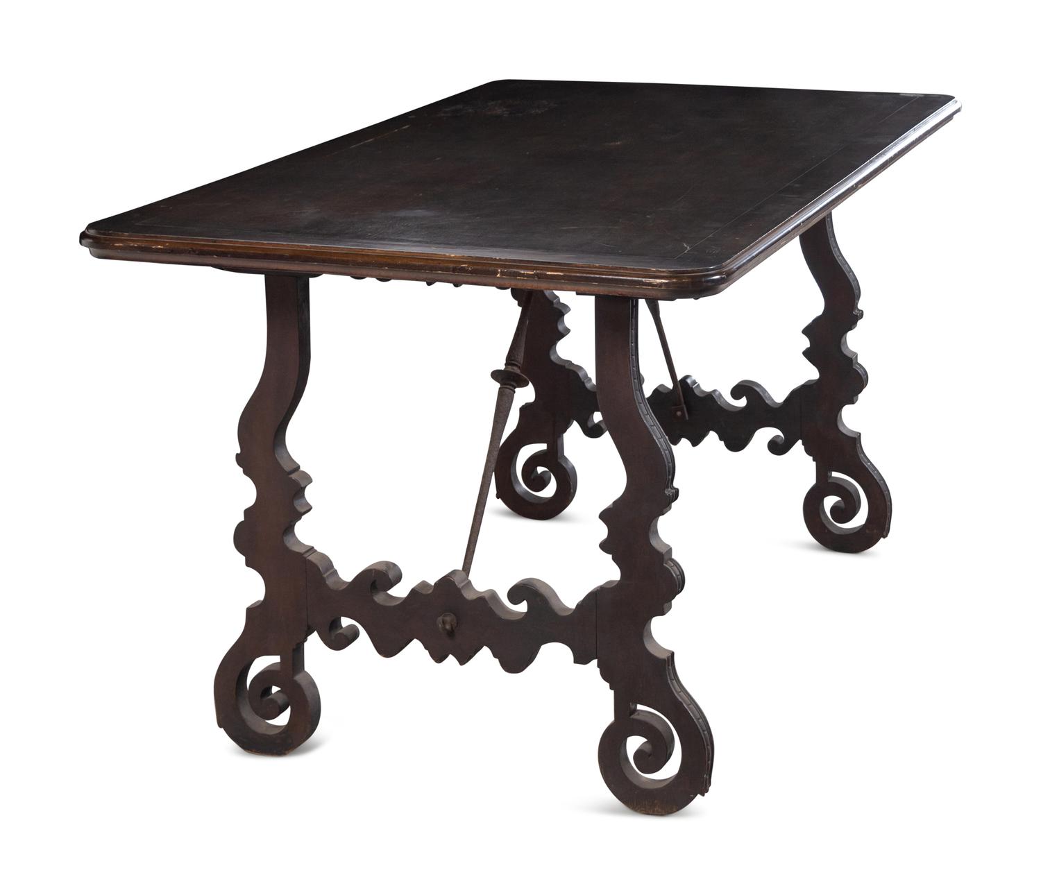 A Spanish Baroque Style Iron Mounted Walnut Trestle Table