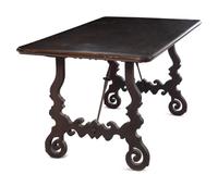 A Spanish Baroque Style Iron Mounted Walnut Trestle Table