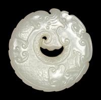 A Carved White Jade 'Dragon' Pendant