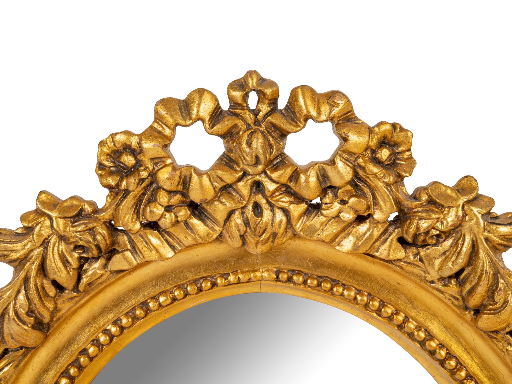 A George III Style Gilt Decorated Oval Mirror