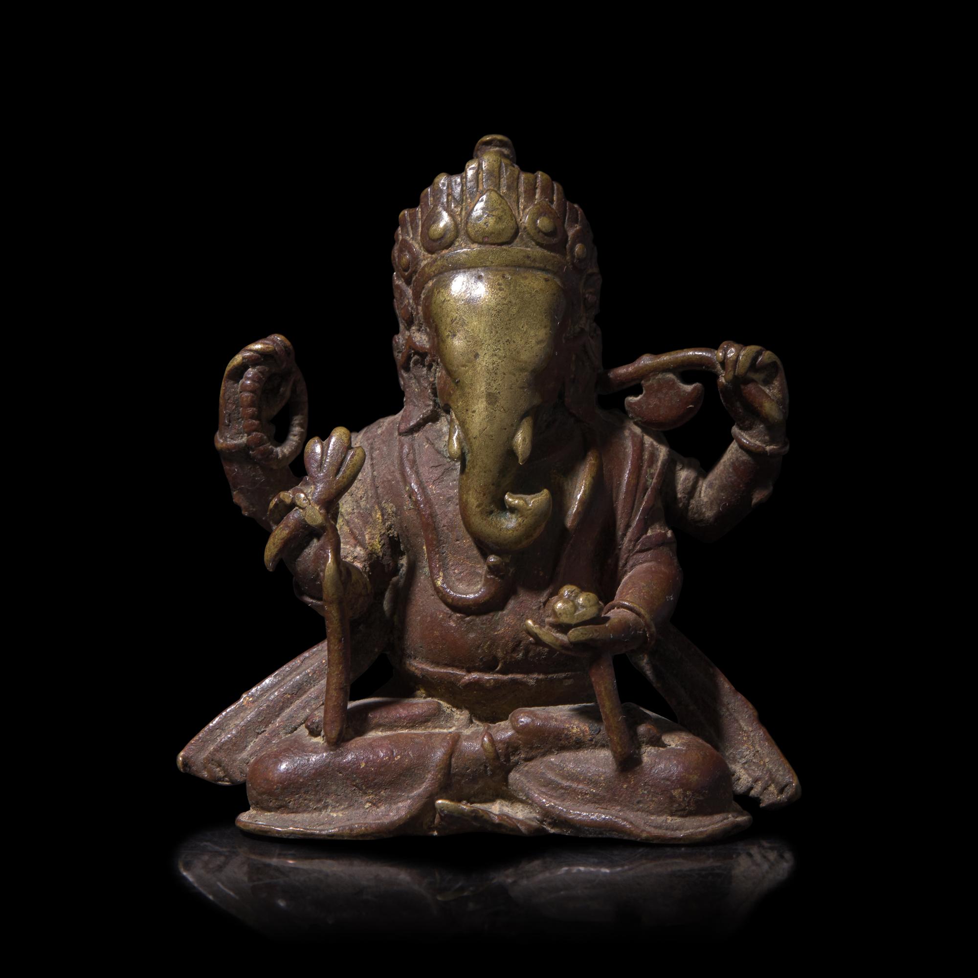 A Small Patinated Brass Alloy Figure of Seated Ganesha, 16th/17th Century 袖珍銅加漆迦尼薩一樽